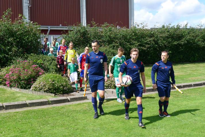 players and officials entering